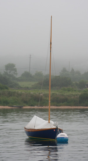 Small sailboat attached to a mooring in Block Island